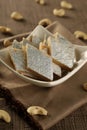 Delicious Indian Sweet Kaju Katli in a White Bowl