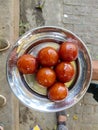 A delicious indian sweet named GulabJaamun.