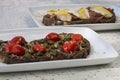 Delicious Italian bruschetta with toasted bread and with cherry tomatoes, basil and garlic and toasted bread with fresh cheese, Royalty Free Stock Photo