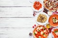 Delicious Italian food side border on a white wood background Royalty Free Stock Photo