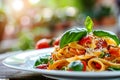 Delicious Italian Pasta Dish with Fresh Basil, Cherry Tomatoes, Olive Oil, and Parmesan Cheese Royalty Free Stock Photo