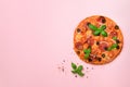 Delicious italian pizza, basil leaves, salt, pepper on pink background with copyspace. Top view. Banner. Pattern for Royalty Free Stock Photo