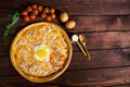 Delicious Italian pizza with egg top view close-up Royalty Free Stock Photo