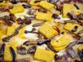 Delicious Italian pizza with mushrooms and polenta, cooked in the wood oven