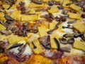 Delicious Italian pizza with mushrooms and polenta, cooked in the wood oven