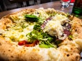 Delicious Italian white pizza for real epicureans, cooked in a w