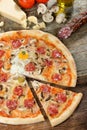 Delicious italian pizza with Salami and egg Royalty Free Stock Photo