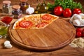 Delicious italian pizza served on wooden table. sliced pizza. Pizza margarita with tomato sauce, fresh mozzarella, parmesan and Royalty Free Stock Photo