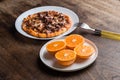 Delicious italian pizzas served on wooden table wiht orange Royalty Free Stock Photo