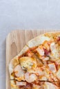 Delicious italian seafood pizza served on wooden table. Top view Royalty Free Stock Photo