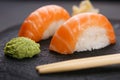 Delicious Japanese cuisine, nigiri sushi with salmon served with Royalty Free Stock Photo