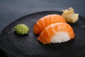 Delicious Japanese cuisine, nigiri sushi with salmon served with Royalty Free Stock Photo