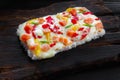 Delicious japanese food. Piece of rice pizza with salmon served