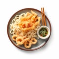 Delicious Japanese Udon Noodles with Crispy Tempura on a Plate.