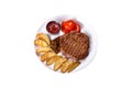Delicious juicy beef steak with baked potatoes and sauces on a white dish Royalty Free Stock Photo
