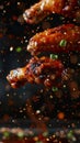 Fried juicy chicken wings, delicious juicy chicken wings with spices and sauce close-up Royalty Free Stock Photo