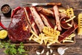 Pork ribs, french fries and grilled corncobs Royalty Free Stock Photo