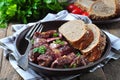 Delicious juicy rare beef steak with rye bread bran Royalty Free Stock Photo