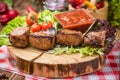 Delicious juicy skewered meat or shish kebabs on skewers of pork tenderloin Royalty Free Stock Photo