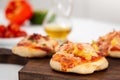 Delicious just baked homemade mini pizzas. Hawaiian pizza Royalty Free Stock Photo