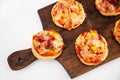 Delicious just baked homemade mini pizzas. Salami pizza Royalty Free Stock Photo