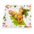 Delicious kebab on skewers. Isolated on a white