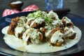 Keto Diet Beef Meatballs in Low-Carb Bechamel Sauce and Freshly Grated Parmesan. Royalty Free Stock Photo