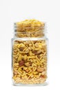 Delicious Khatta Meetha in a glass jar, made with peanuts, sugar, raisins, and besan sev.