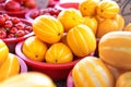 Delicious korean stripe yellow melon fruit food in red plastic basket at tradition market afternoon, Seoul, South Korea, harvest Royalty Free Stock Photo