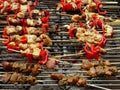 Delicious lamb skewers barbecue with red peppers on a charcoal grill