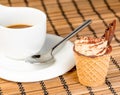 Delicious little coffee cake with chocolate near a cup of coffee