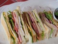 A delicious looking club sandwich on a white plate