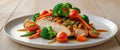 A delicious looking meal of chicken with colorful vegetables is displayed. Royalty Free Stock Photo