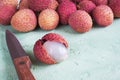 Delicious lychees on a green table. Top view.