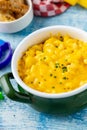 Delicious Mac n Cheese or macaroni and cheese on a green porcelain plate Royalty Free Stock Photo