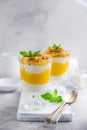 Delicious mango, passion fruit and cream cheese layered dessert