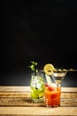 Martini drink with olive and mojito with mint and bloody mary with celery Royalty Free Stock Photo