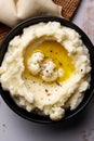 Delicious mashed cauliflower with butter and pepper on a plate. Healthy nutritious food for holiday dinner picnic potluck