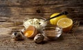 Delicious mayonnaise sauce on wooden background. Homemade mayonnaise. Sour cream. Ingredients for mayonnaise sauce