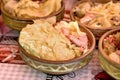 Sauerkraut - cabbage with smoked knuckle, ham hock, pork knees, pork shoulder in earthy bowl