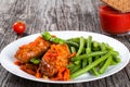 Delicious Meat Cutlets stewed with tomato sauce