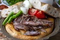 Delicious meat dish from Turkish cuisine Konya oven kebab, tandoori kebab. Turkish name Konya furun or firin kebabi, tandir