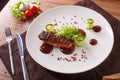 Delicious meat loaf with ketchup on a white plate, macro horizontal Royalty Free Stock Photo