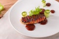 Delicious meat loaf with ketchup on a white plate, macro horizontal Royalty Free Stock Photo
