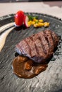 Delicious medium rare wagyu beef  steak with gravy sauce Royalty Free Stock Photo