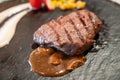 Delicious medium rare wagyu beef  steak with gravy sauce Royalty Free Stock Photo