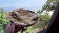 Delicious mendoan on plate traditional food from banyumas indonesia made from fried tempe with surumanis beach view