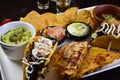delicious Mexican cuisine guacamole, taco, tortilla, spicy Mexican chille