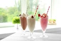 Delicious milkshakes on table Royalty Free Stock Photo