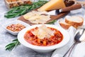 Delicious minestrone soup with cavatappi pasta, beans and vegetables with crispy bread, horizontal Royalty Free Stock Photo